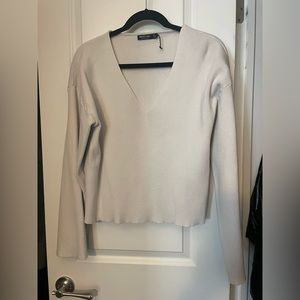 Cropped white sweater